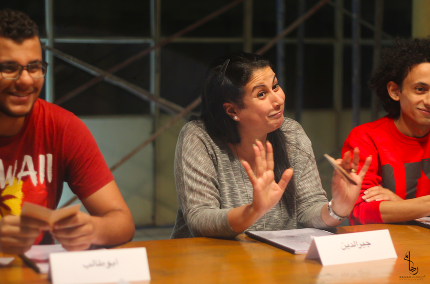 People discussing at a table