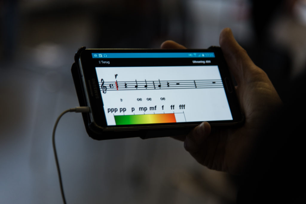 An image of a smartphone with musical notes.