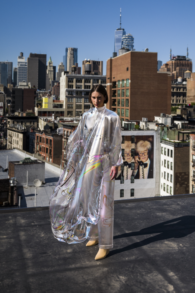 A woman on a rooftop wearing ‘Iridescence’ by The Fabricant, 2019